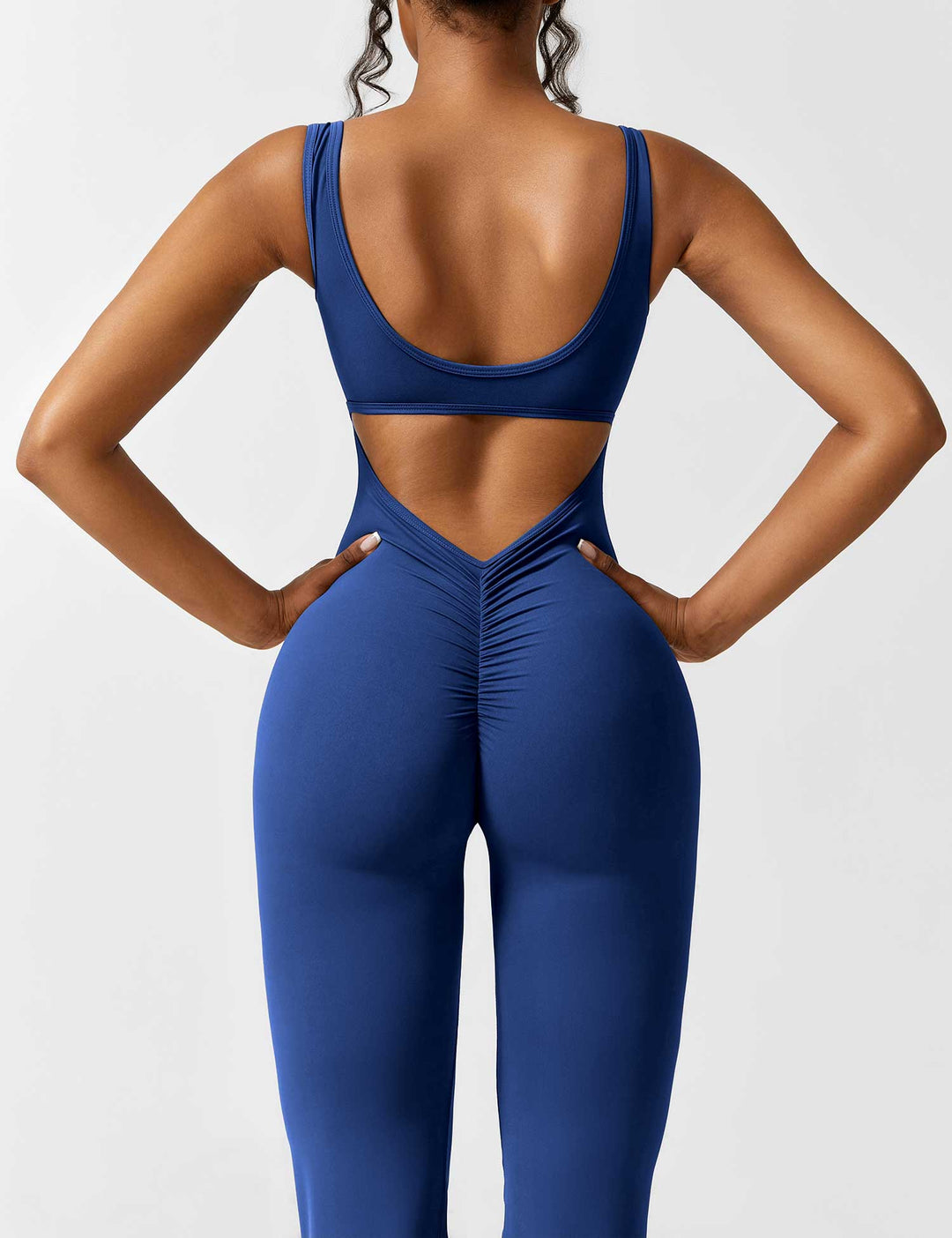 LIVIA – Flared Open-Back Jumpsuit with Scrunch Butt